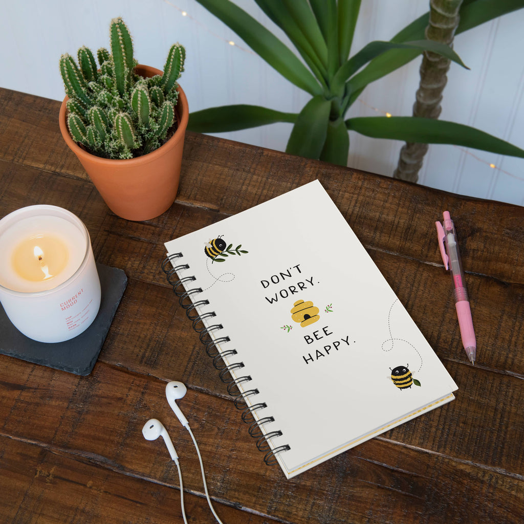 Don't Worry Bee Happy Spiral Notebook by Studio Oh!
